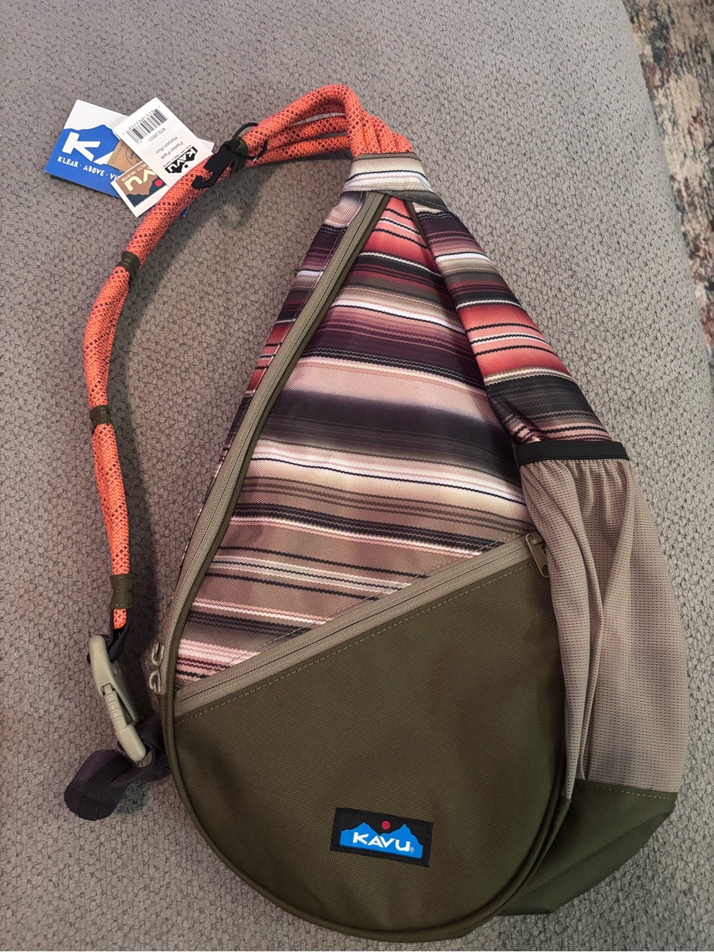 Kavu Olive Sling Bag with Multicolor Stripe Panel and Orange Strap